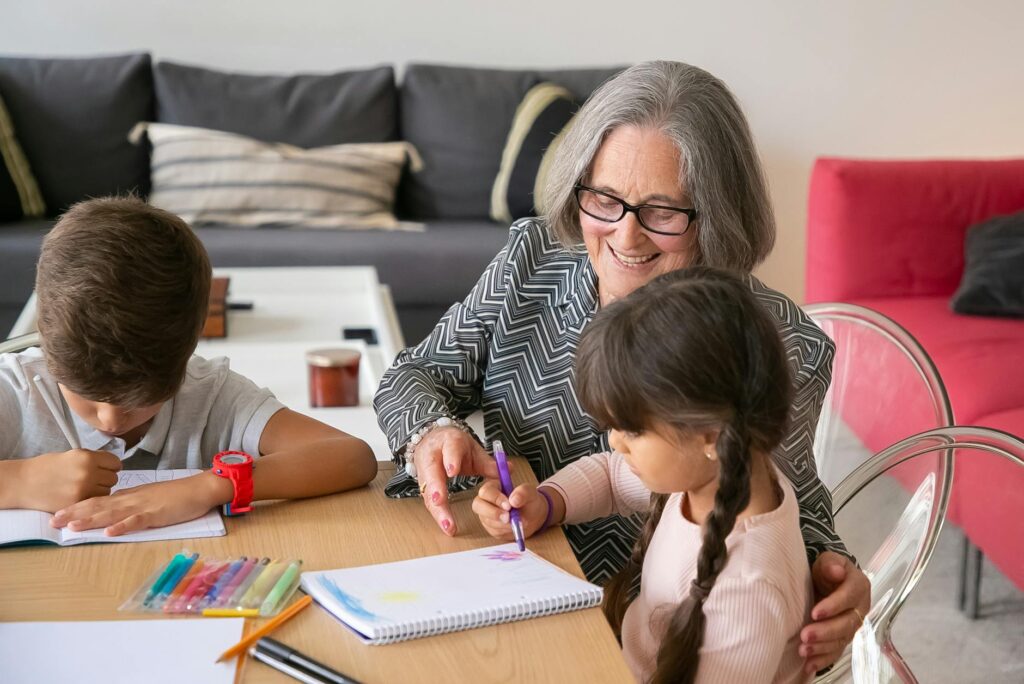 A cozy learning space set up for grandchildren with books and art supplies. — home learning environment grandfamilies Utah