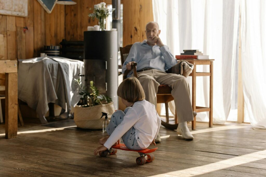 A cozy setting where a grandparent and grandchild are talking. — changes behavior grandchildren divorce