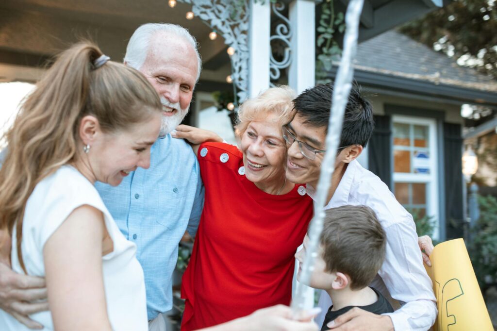 A family gathering in a backyard, showcasing strong family connections and effective coping strategies for grandparents Ut…