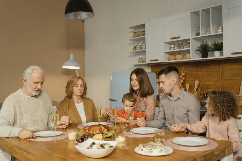 A family gathering showcasing different generations coming together, illustrating the importance of a support network for grand families.