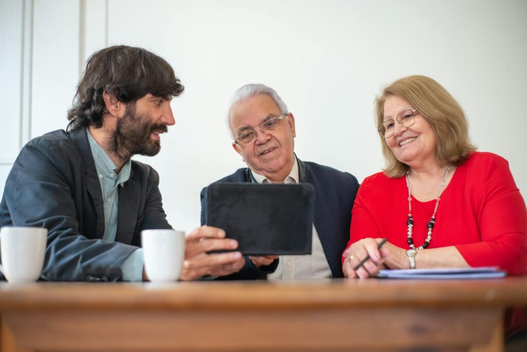 A group of grandparents at a community support meeting in Utah, showing local organizations helping grandfamilies with financial planning grandfamilies Utah.