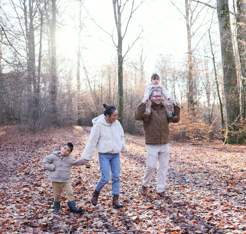 A happy family portrait of a grandfamily enjoying a day out together, showcasing their strong support network grandfamilies Utah.