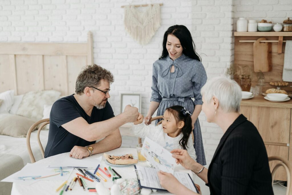 A happy family portrait of a successful grandfamily navigating the foster care system. — Utah foster care grandfamilies