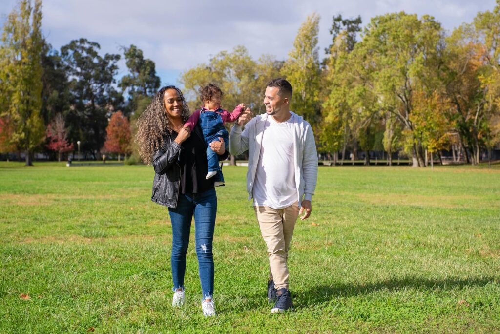 A happy grandfamily enjoying time together in a park setting. — grandfamilies legal rights Utah