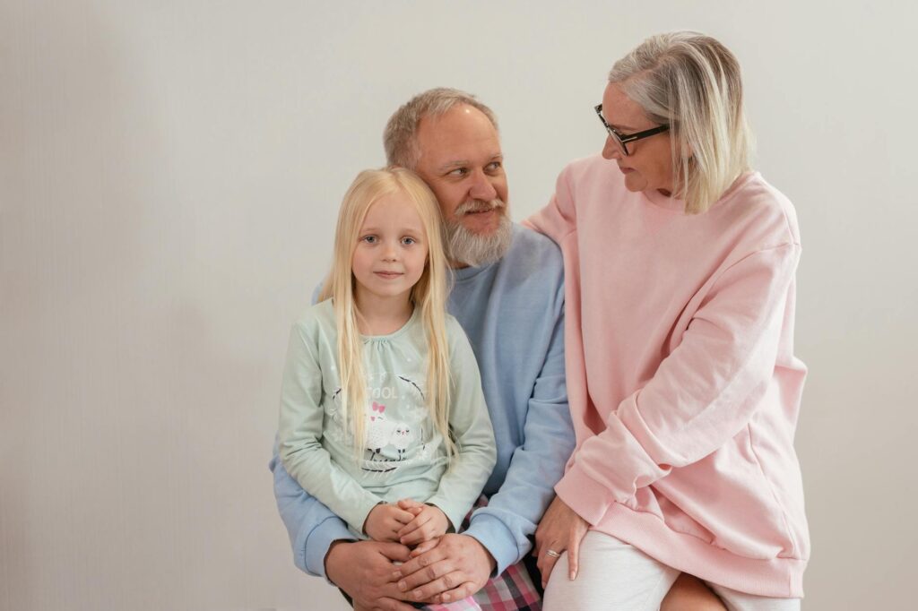 A heartwarming photo of a grandparent with their grandchild, emphasizing the bond of grandfamilies and their legal rights …