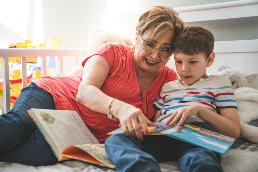 A joyful grandparent reading a story to their grandchild, showcasing quality time. — resources for grandparents Utah
