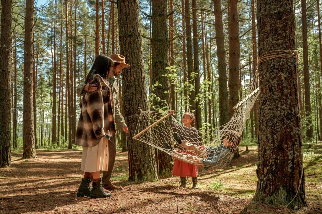 A serene image of a family enjoying a day out together, symbolizing financial security and happiness. — financial planni…
