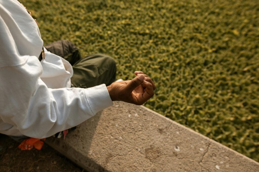 A serene image of a grandparent practicing mindfulness through meditation. — coping strategies grandparents Utah