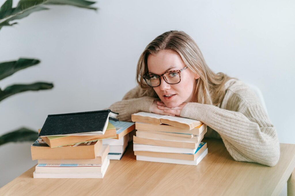 A stack of books about emotional intelligence for kids on a table. — emotional intelligence grandchildren divorce