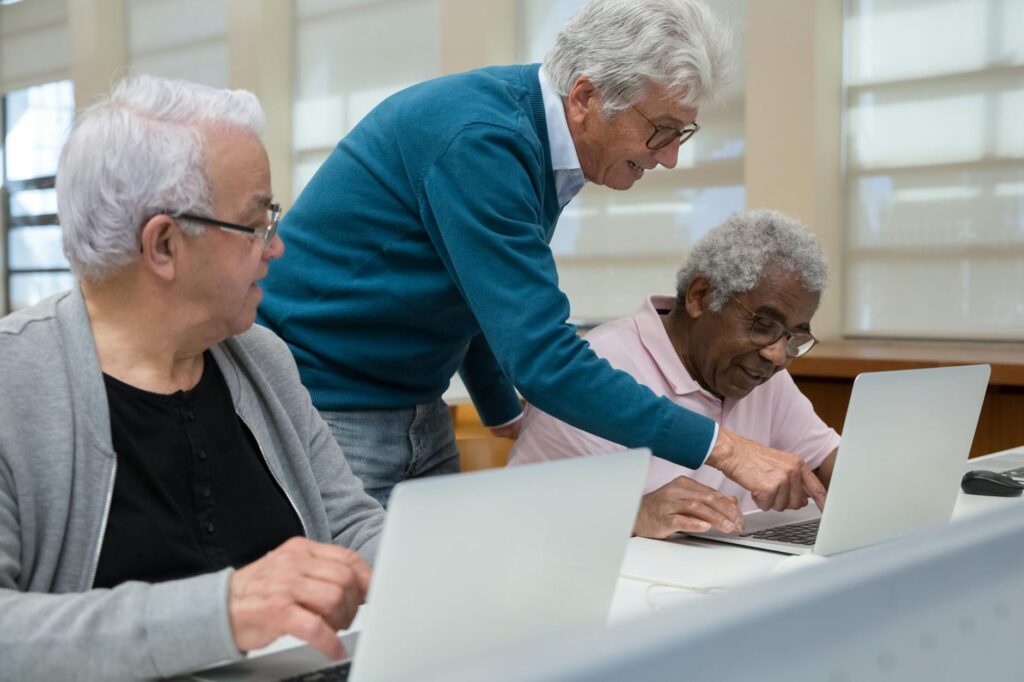 A supportive group of grandparents sharing experiences at a community center in Utah. — emotional support grandparents Utah
