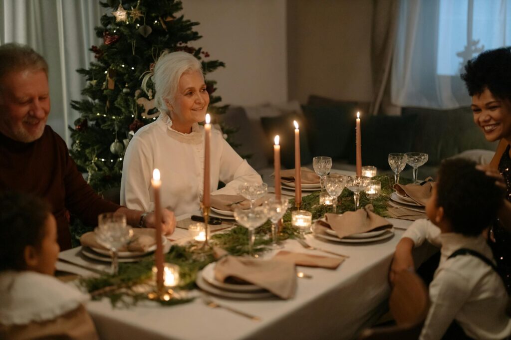 A warm family gathering during the holidays, featuring smiling grandchildren and grandparents. — holidays grandchildren …