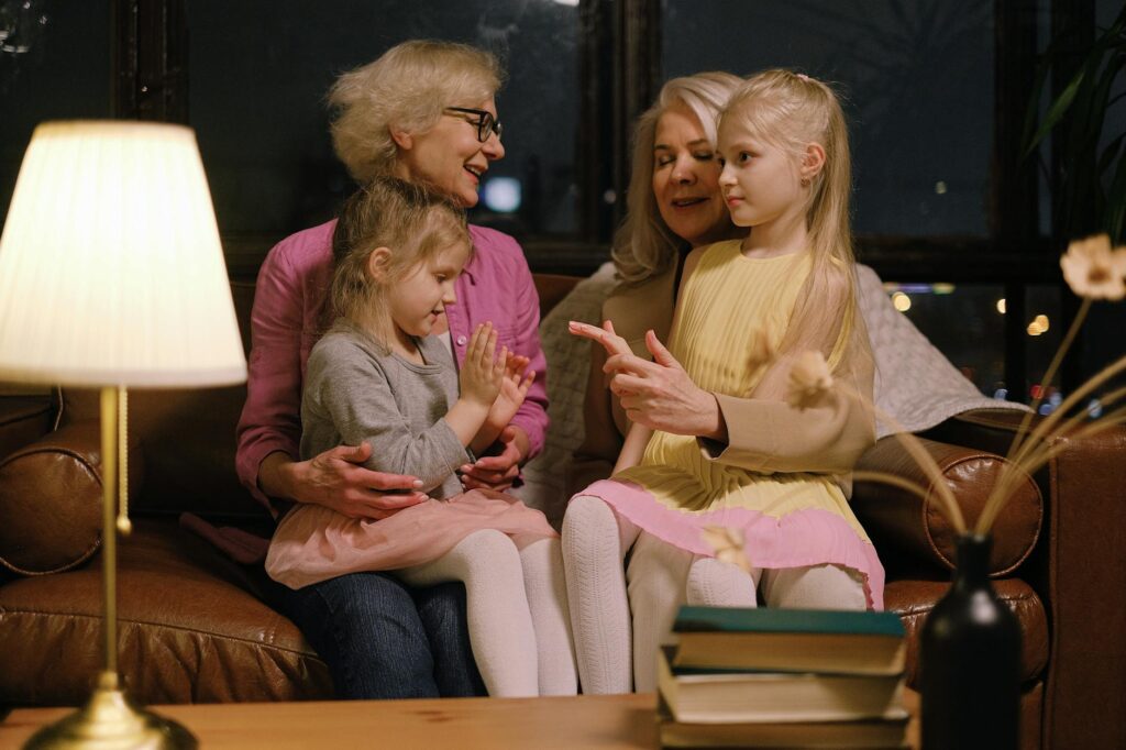 A warm family gathering showcasing a grandparent with grandchildren in a home setting. — grand families Utah