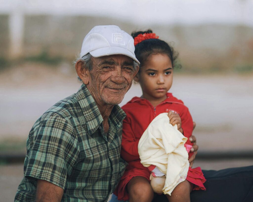 A happy family portrait of a grandparent with their grandchild, illustrating kinship care. — resources for grandparents …