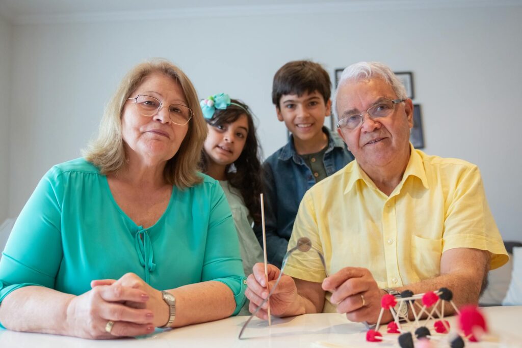 An illustration showing the connection between grandparents and grandchildren in a supportive environment. — grand famil…