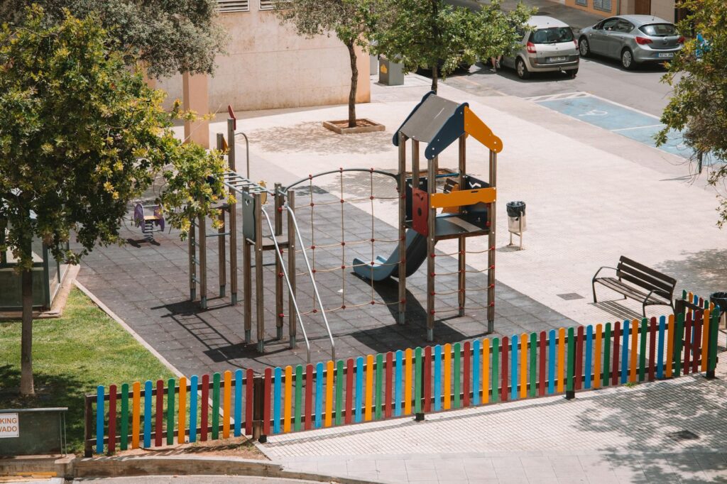 Safe outdoor play area with secure fencing and clean play equipment. — safe home for grandchildren Utah